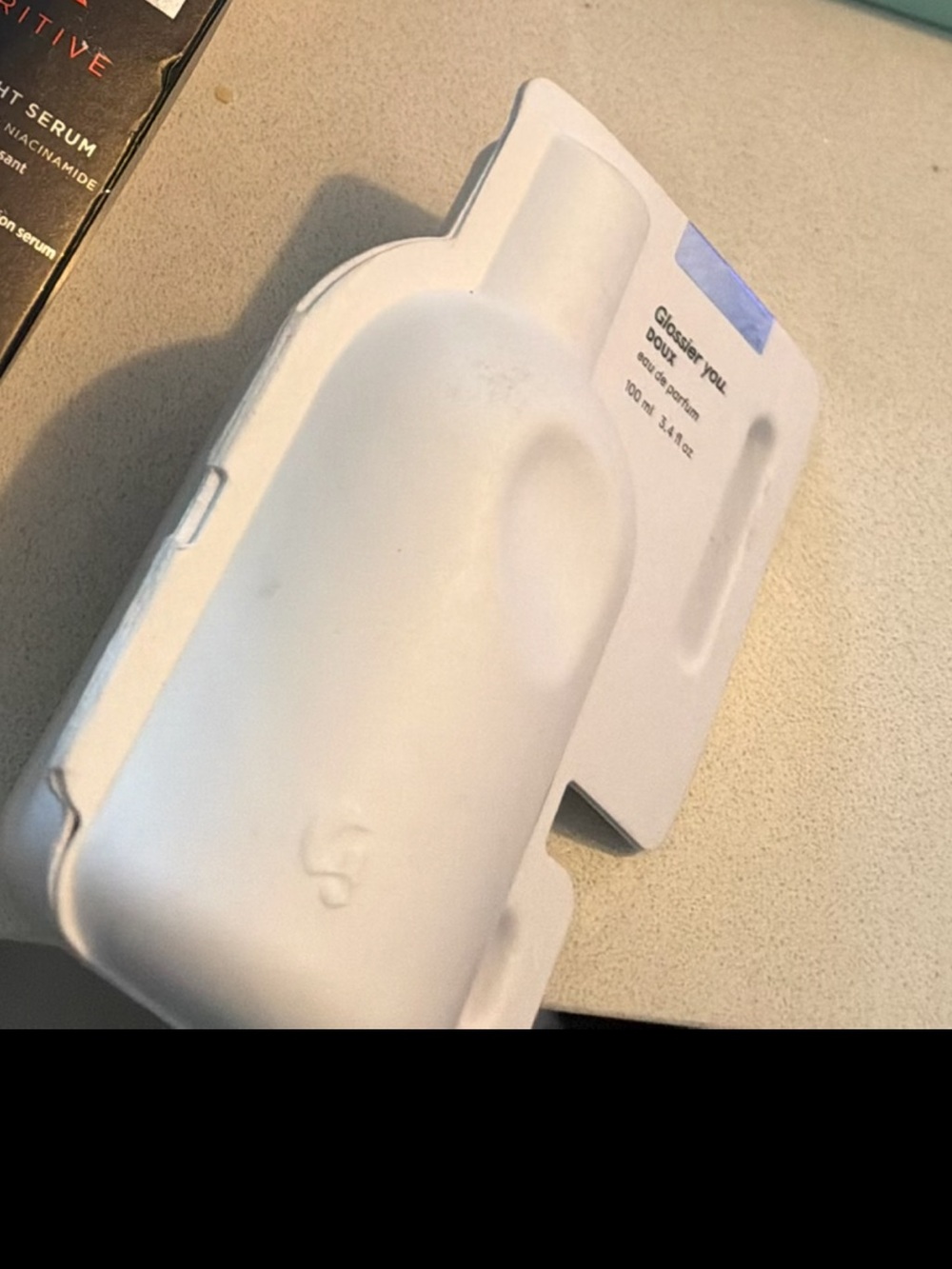 Glossier White
